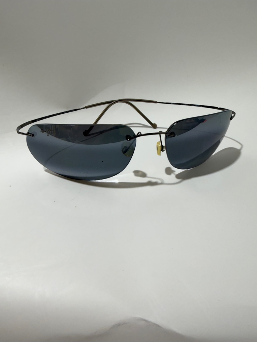 Maui Jim Rimless Polarized Sunglasses with Dark Gray Lenses